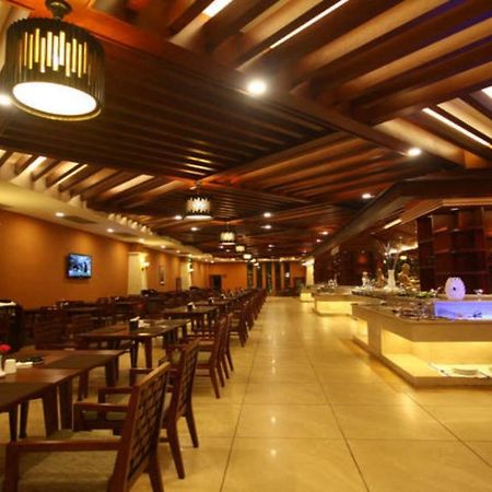 Ramada Plaza Xishuangbanna Hotel Exterior photo